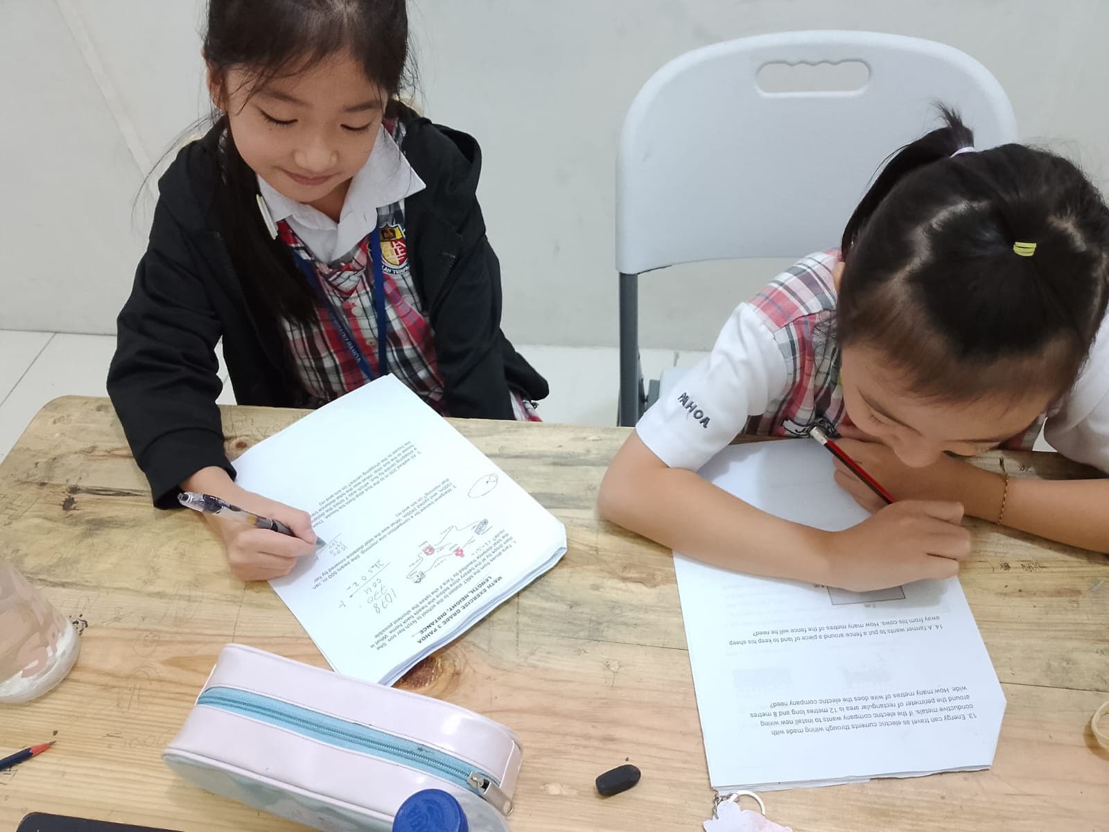 Anak menulis dan berhitung